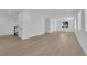 Open-concept living room with hardwood flooring and ample natural light at 2033 Old Field Ave, North Las Vegas, NV 89081
