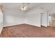 Primary bedroom with carpet and ceiling fan at 2107 Akamine Ave, North Las Vegas, NV 89031