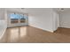 Living room with hardwood floors and built-in shelving at 2107 Akamine Ave, North Las Vegas, NV 89031