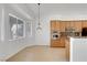 Kitchen nook with built-in seating and large windows at 2138 Ponticello Dr, Henderson, NV 89052