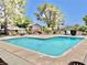 Inviting community pool with surrounding patio at 2340 Canfield Dr # A, Las Vegas, NV 89108