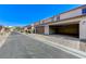 View of garages and pavers outside townhomes on a sunny day at 2347 Via Barranca St, Henderson, NV 89044