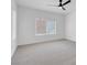 Bright bedroom with neutral carpeting and ceiling fan at 2735 Fort Myer Ave, Henderson, NV 89052