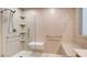 Walk-in shower with built-in seat and grab bars at 2771 Fort Myer Ave, Henderson, NV 89052