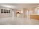 Open dining area with chandelier and view of kitchen at 2771 Fort Myer Ave, Henderson, NV 89052