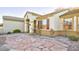 Front view of house with stone pathway and landscaping at 2771 Fort Myer Ave, Henderson, NV 89052