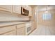 Kitchen with built-in microwave, oven, and cooktop at 2771 Fort Myer Ave, Henderson, NV 89052