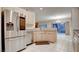 Kitchen with stainless steel appliances and light wood cabinets at 2771 Fort Myer Ave, Henderson, NV 89052