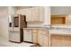 Modern kitchen features stainless steel appliances and light wood cabinets at 2771 Fort Myer Ave, Henderson, NV 89052