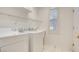Laundry room with washer, dryer, and utility sink at 2771 Fort Myer Ave, Henderson, NV 89052
