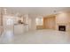 Open floor plan with kitchen, living and dining areas at 2771 Fort Myer Ave, Henderson, NV 89052