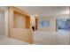 Living room with tile floors, fireplace, and large windows at 2771 Fort Myer Ave, Henderson, NV 89052