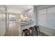 Modern kitchen with white cabinets and a breakfast bar at 2821 Kensington St, Las Vegas, NV 89156