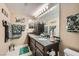 Bathroom features dark wood vanity, granite countertop, and teal accents at 2855 Geary Pl # 3205, Las Vegas, NV 89109