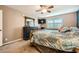 Guest bedroom with dark dresser and patterned bedding at 2855 Geary Pl # 3205, Las Vegas, NV 89109