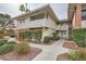 Brick condo building with landscaped grounds at 2855 Geary Pl # 3205, Las Vegas, NV 89109