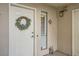 Inviting condo entry with wreath and white door at 2855 Geary Pl # 3205, Las Vegas, NV 89109