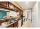 Modern kitchen with granite countertops and stainless steel appliances at 2855 Geary Pl # 3205, Las Vegas, NV 89109