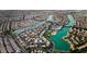 Aerial view of a lake community with many houses at 3150 Soft Breezes Dr # 2025, Las Vegas, NV 89128