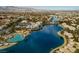 Aerial view of lake community with resort style pool at 3150 Soft Breezes Dr # 2025, Las Vegas, NV 89128
