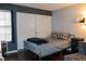 Bedroom with a double bed and dark gray walls at 3150 Soft Breezes Dr # 2025, Las Vegas, NV 89128