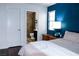 Main bedroom with ensuite bathroom and wood floors at 3150 Soft Breezes Dr # 2025, Las Vegas, NV 89128