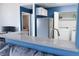 Kitchen features gray countertops, stainless steel appliances, and a breakfast bar at 3150 Soft Breezes Dr # 2025, Las Vegas, NV 89128