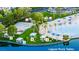 Aerial view of Desert Shores lagoon area with picnic tables, basketball and volleyball courts at 3150 Soft Breezes Dr # 2025, Las Vegas, NV 89128
