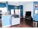 Open living area with hardwood floors and comfy seating at 3150 Soft Breezes Dr # 2025, Las Vegas, NV 89128