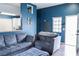 Living room with comfy seating and hardwood floors at 3150 Soft Breezes Dr # 2025, Las Vegas, NV 89128