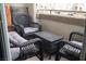 Private patio with wicker furniture at 3150 Soft Breezes Dr # 2025, Las Vegas, NV 89128