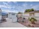 Landscaped backyard with storage shed and patio at 3209 Tularosa Ln, Las Vegas, NV 89122