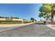 Neat community entrance with landscaping and signage at 3209 Tularosa Ln, Las Vegas, NV 89122