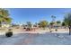 Peaceful community park with picnic tables and walking path at 3209 Tularosa Ln, Las Vegas, NV 89122