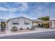 Single-story home with carport and desert landscaping at 3209 Tularosa Ln, Las Vegas, NV 89122