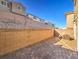 Private backyard with paver patio and block wall at 374 Yellow Finch Ln, Henderson, NV 89012