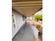 The home features a long, covered back porch with a concrete floor at 4130 Balboa Ave, Las Vegas, NV 89121