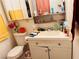 Bathroom with toilet, sink, and vanity at 4130 Balboa Ave, Las Vegas, NV 89121