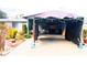 Covered carport area with additional storage space at 4130 Balboa Ave, Las Vegas, NV 89121