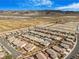 Aerial view of a residential neighborhood with mountain backdrop, showcasing community layout and design at 4331 Via Gallo Ct # 1, Pahrump, NV 89061