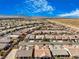 Panoramic aerial view of a residential community featuring tiled roofs and distant mountain views at 4331 Via Gallo Ct # 1, Pahrump, NV 89061