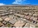 Expansive aerial view of a well-planned community with mountain backdrop under a blue sky at 4331 Via Gallo Ct # 1, Pahrump, NV 89061