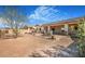 Spacious backyard with a covered patio and outdoor seating area, perfect for entertaining at 4331 Via Gallo Ct # 1, Pahrump, NV 89061