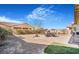 Spacious backyard with a covered patio and outdoor seating area, perfect for entertaining guests at 4331 Via Gallo Ct # 1, Pahrump, NV 89061