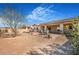 Spacious backyard with a covered patio and outdoor seating area, perfect for entertaining at 4331 Via Gallo Ct # 1, Pahrump, NV 89061