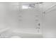 Clean bathroom featuring a shower-tub combo and white tile surround at 4331 Via Gallo Ct # 1, Pahrump, NV 89061