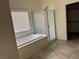 Bathroom features a soaking tub, separate shower, and neutral paint at 4331 Via Gallo Ct # 1, Pahrump, NV 89061