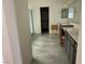 Bathroom featuring tile flooring, dual sink vanity, glass shower, and walk-in closet at 4331 Via Gallo Ct # 1, Pahrump, NV 89061