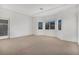 Spacious carpeted room with bright natural light and modern trim at 4331 Via Gallo Ct # 1, Pahrump, NV 89061