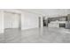 Spacious living room featuring an open floor plan with tile floors that leads to the kitchen at 4331 Via Gallo Ct # 1, Pahrump, NV 89061
